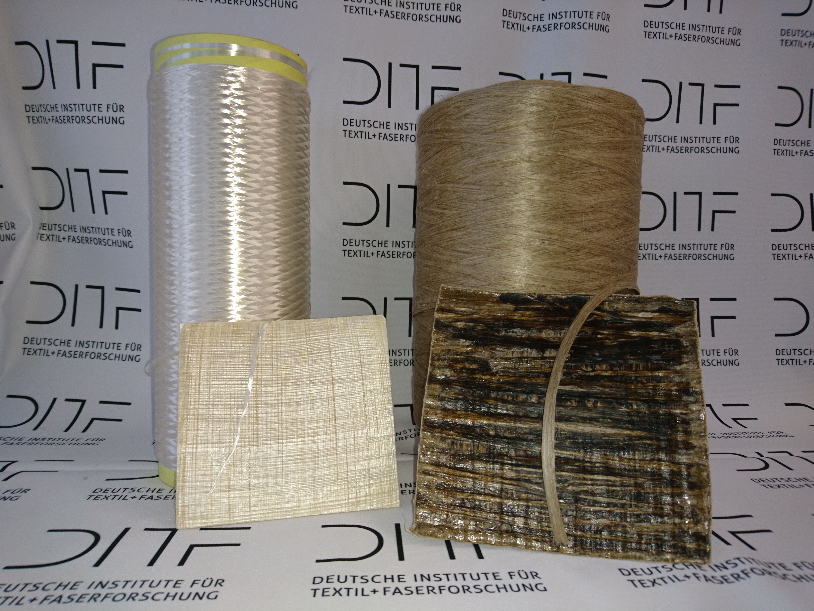 PureCell - pure composite material made from cellulosic tire cord fibers (left) and from natural fibers (right) by DITF Denkendorf